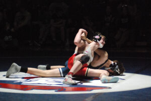 University wrestling upends defending state champ